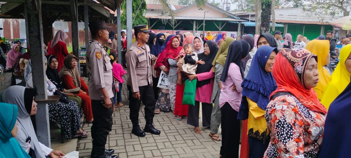 Lagi Dan Lagi Kegiatan Pengamanan Oleh Personel Polsek Tanjung Pura, Penerima PKH Dan Sembako Di Kecamatan Tanjung pura – Langkat Berjalan Lancar.