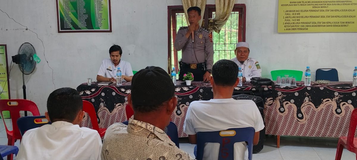 Personil Polsek Tanjung Pura Menghadiri Undangan Musyawarah Masyarakat Desa Suka Maju