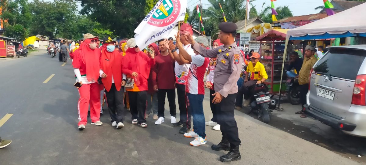 Menyambut Hari Kemerdekaan Republik Indonesia, Ke-79 Tahun 2024, Kecamatan Tanjung Pura Melaksanakan, “Gerak Jalan Santai” Meliputi Para Siswa, Guru Dan Forkopimcam.