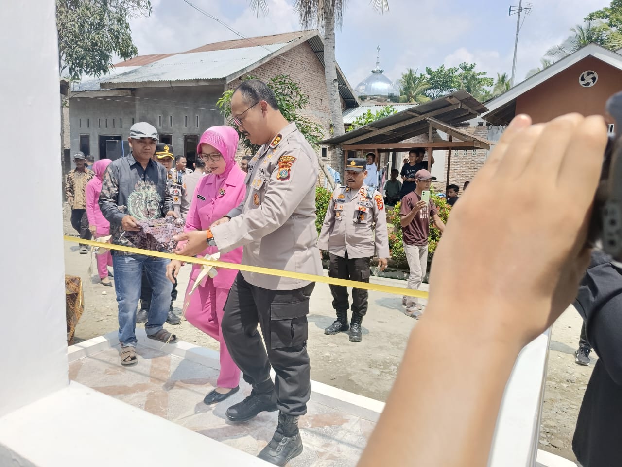 Presmian Sumur Bor, ” Sang Bhayangkara ” Oleh Kapolres Langkat, Dalam Rangka Hari Bhayangkara Ke-79 , Di Tanjung Pura. –